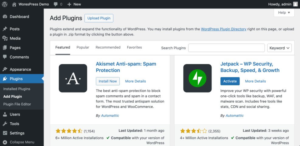 WordPress Add Plugins page, showing Akismet and Jetpack, for installing new plugins to enhance website functionality during setup.