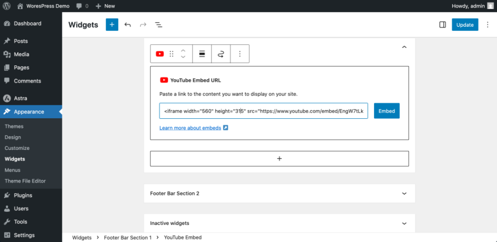 WordPress Widgets screen with an open YouTube Embed block, showing iframe code for how to add video to WordPress.
