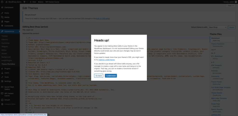 WordPress Theme File Editor displaying 'Heads up!' warning against direct code edits and recommending child themes.